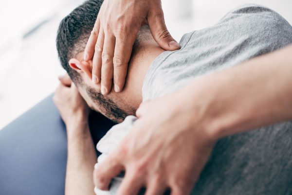 Hands-on neck treatment, representing personalized chiropractic care for neck pain, stiffness, and better movement